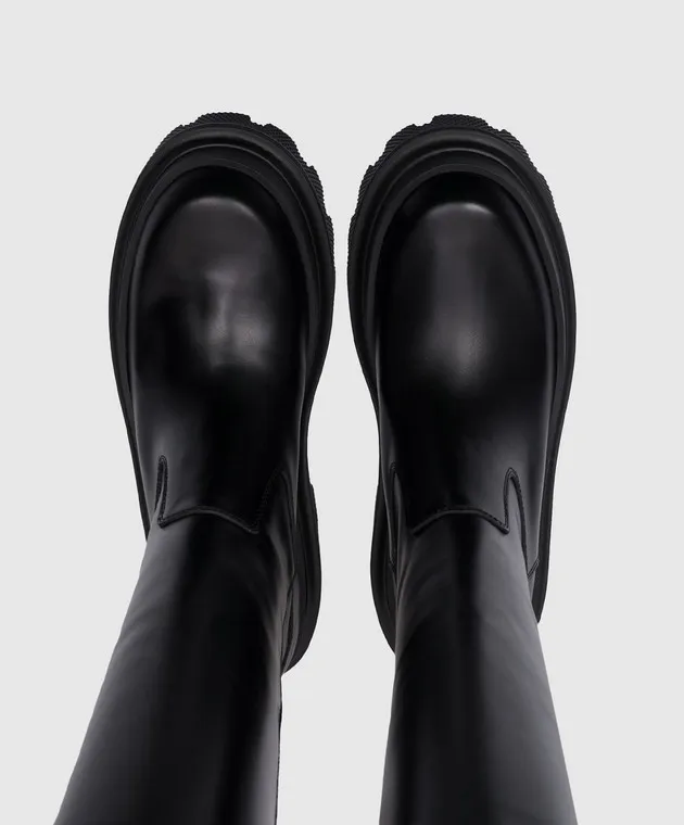 Dolce&Gabbana Stivali in pelle nera con logo in metallo CU1070AB640